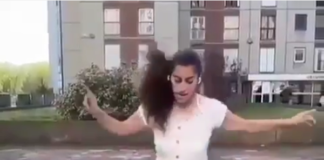Lady showing skills with juggling soccer ball
