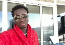 Micheal Blackson shows off his two sons