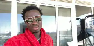 Micheal Blackson shows off his two sons