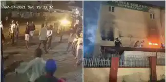 Watch the shocking moment sister of the girl who burnt down Ebeano Supermarket was caught on CCTV smiling during the incidence (video)