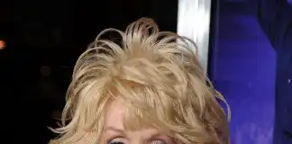 American music legend, Dolly Parton says rumour of her insuring her breasts is 'not true'
