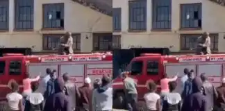 Watch moment Residents use buckets to pour water into Fire Service truck in front of burning building (video)