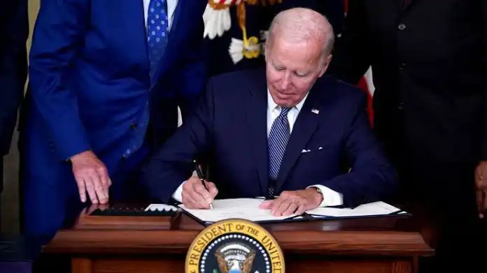 Joe Biden signs $700bn US climate, tax and health bill into law