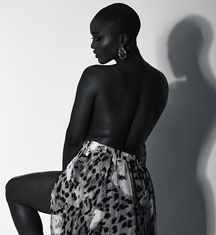 Eva Alordiah shares topless photo as she reveals conversation she had with her father about her relationship status