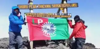Tanzanian obidient hangs Labor party’s flag at the top of Mt. Kilimanjaro