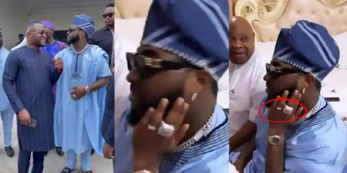 Fans jubilate as Davido is spotted with wedding ring at uncle’s inauguration (Video)
