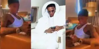 Wizkid blushes hard as mystery lady teases him in a video of them at private lodge