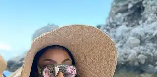 "Gosh bless your mummy for this" Nigerians react as Toke Makinwa shows off major cleaveages while holidaying on a Yatch in Italy