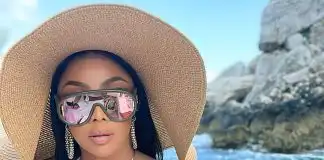 "Gosh bless your mummy for this" Nigerians react as Toke Makinwa shows off major cleaveages while holidaying on a Yatch in Italy