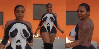 Watch moment Chubby model steps out in painted bare body (Video)