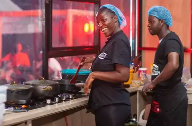 Hilda Baci smiling while stirring food tcm25 752607
