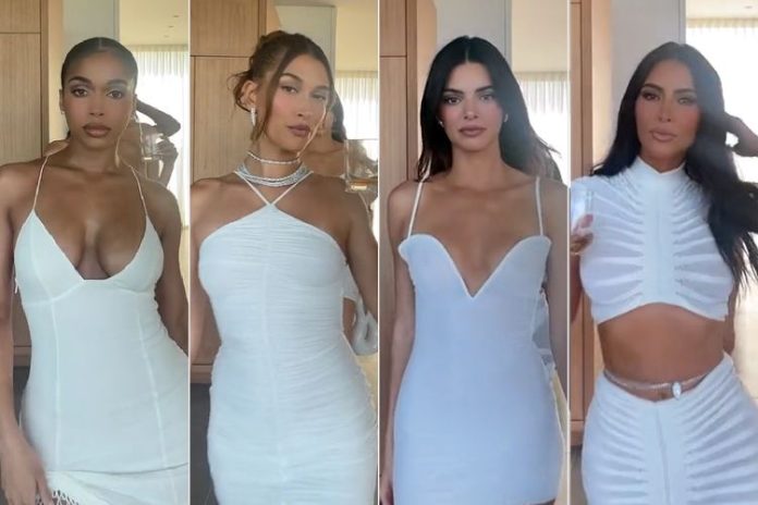 Kim Kardashian shows off curves in white crop top as she matches Kendall and Hailey
