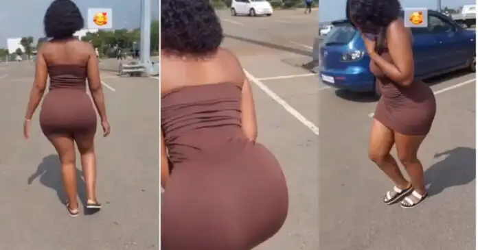 This busty slay queen brings the streets to a standstill with her body-hugging dress.