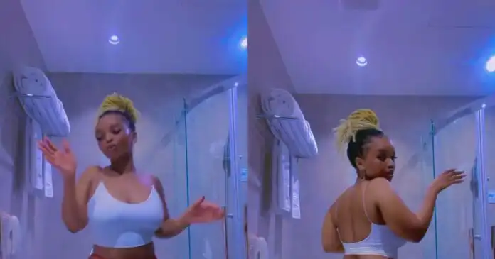 Heavy Load – Massive Reactions as Lady Gives a Glimpse Of Her Big Nyᾶsh (Video)
