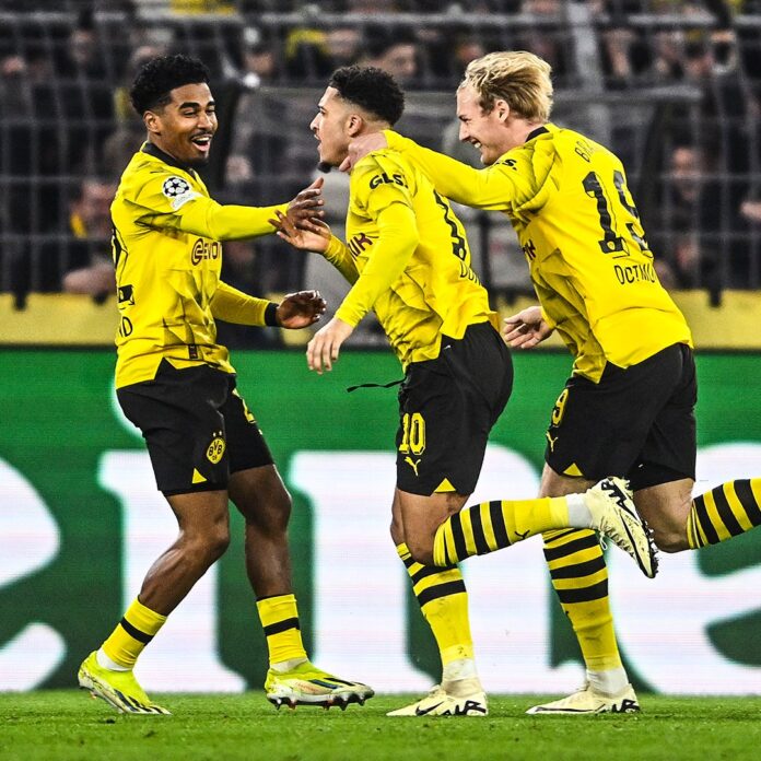 Sancho, Reus lead Dortmund to Champions League quarter-finals for first time since 2021