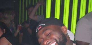 Davido turns heads as he shares loved-up moment with wife, Chioma Adeleke