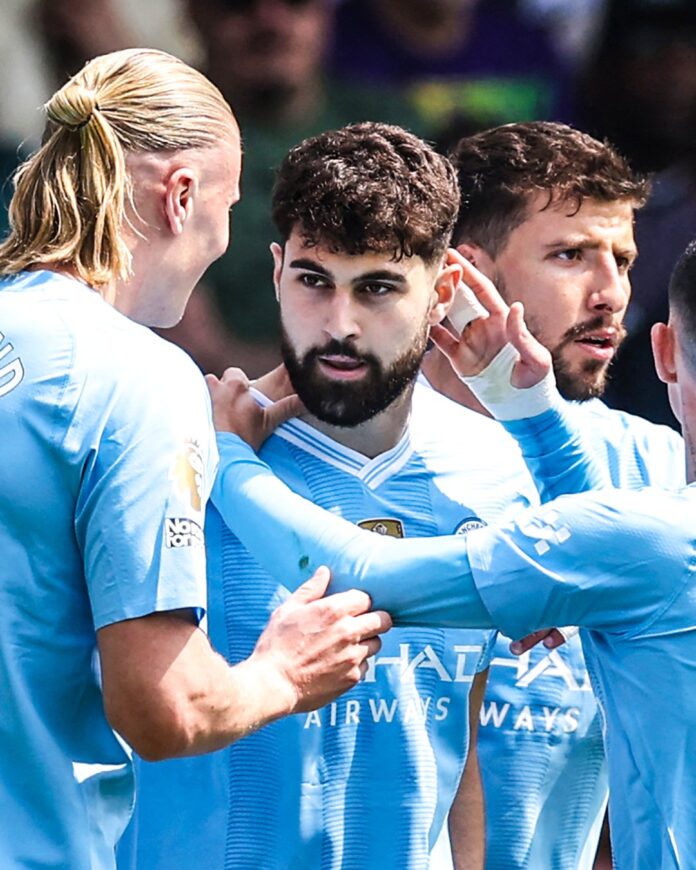 Manchester City crush Fulham 4-0 to pile pressure on Arsenal