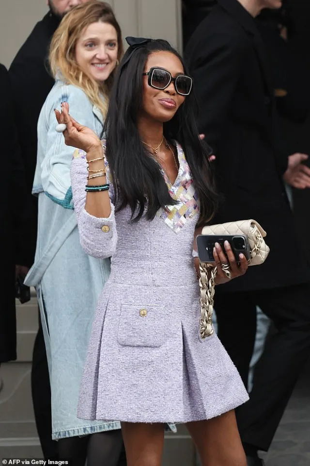 Naomi Campbell Stuns in Lilac Mini Dress at Chanel’s Paris Fashion Week Show