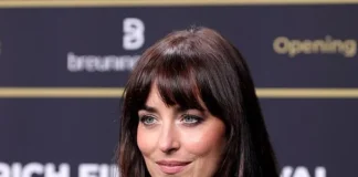 Dakota Johnson Stuns in Daring Lace Gown at Zurich Film Festival