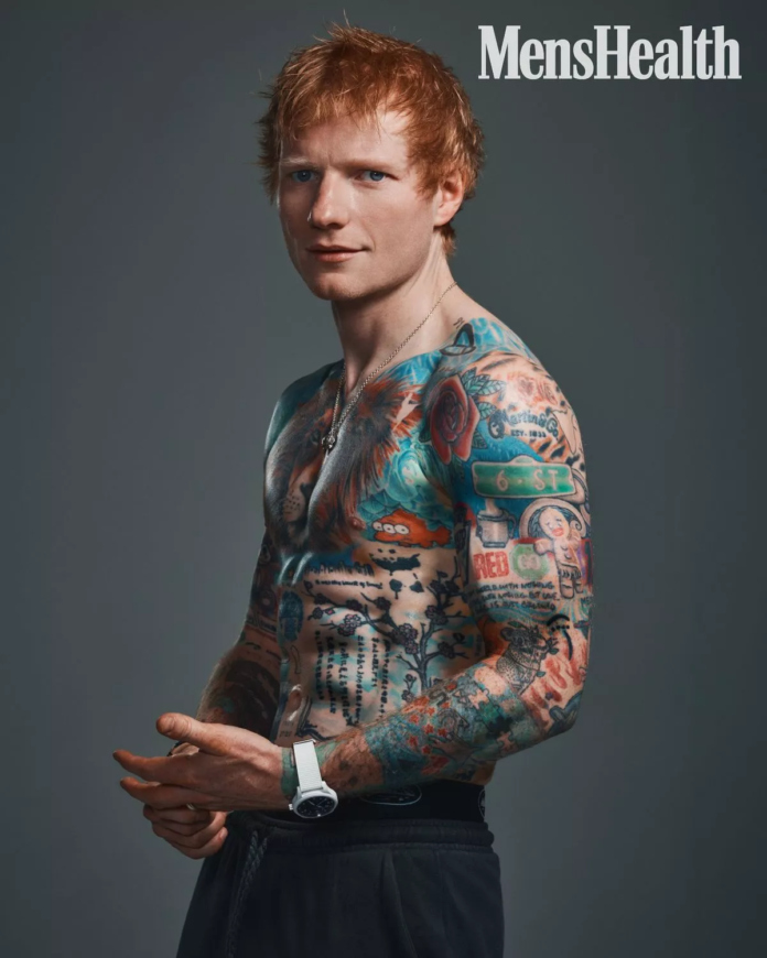 Ed Sheeran reveals ripped physique and huge tattoos as he poses shirtless