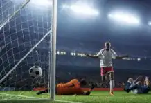 Football player celebrating decisive late Premier League goal 